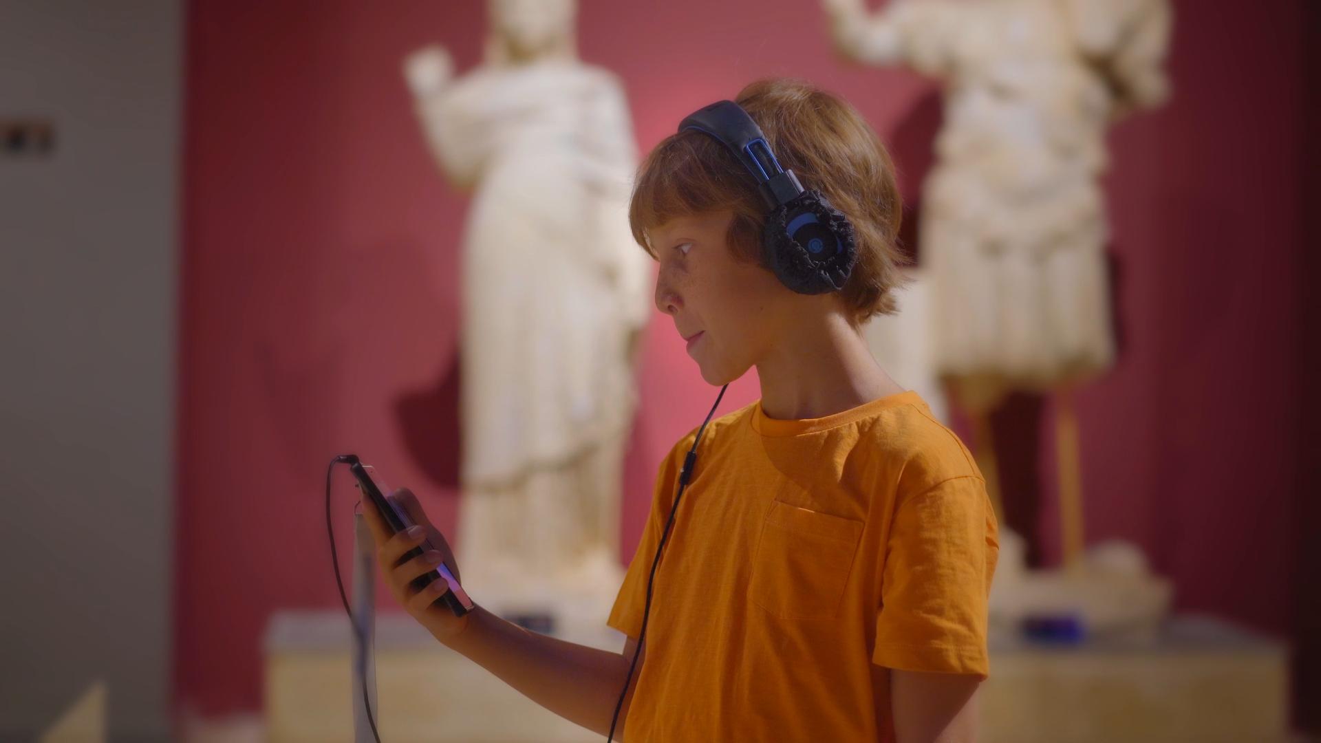 Visitors using personalized audio guides in a museum, listening to detailed stories about the exhibits.